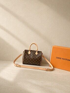 Louis Vuitton Speedy Bandouliere Handbag with Monogram Canvas and Gold Hardware